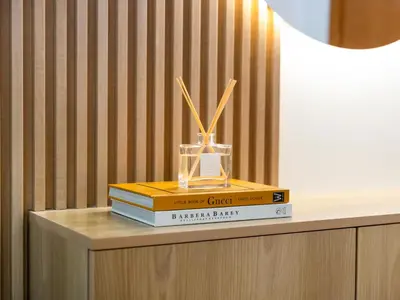 a stack of books on a table with a trophy on top at Sensational direct Sea, AIN View and Palm Jumeirah in Dubai Marina in Dubai
