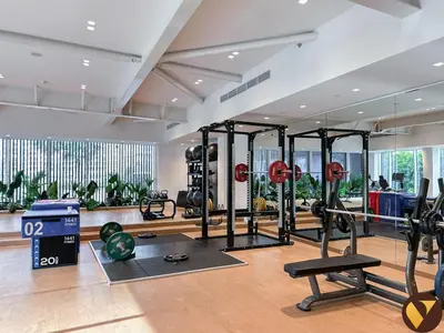 a gym with several treadmills and exercise equipment at Vogue JLT Banyan Tree Residences Hillside, near Marina and JBR, Two Bedroom Apartment with Balcony and City View, Access to all Amenities in Dubai