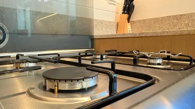 a stove top with a pot on top of it at Premium 2 Bedroom at Creek Horizon in Dubai