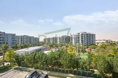a view of a city with tall buildings at Prival - Sunlit Serenity 1BR Retreat in Dubai