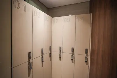 a row of lockers in a locker room at QUARTZ Luxe 1-Bed at Nobles Tower, Near Downtown in Dubai