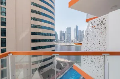 a view from the balcony of a cruise ship at Luxurious apartment 8 mins from Burj Khalifa in Dubai
