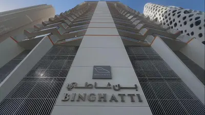a tall building with a sign on the side of it at Luxurious apartment 8 mins from Burj Khalifa in Dubai