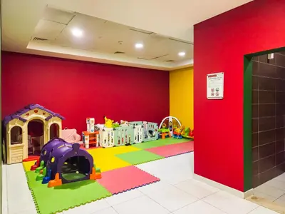 a childrens play room with a red wall at Stunning 1BR with Breathtaking Views Dubai Marina in Dubai