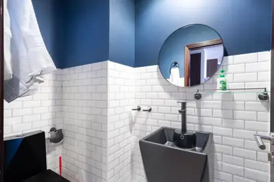 a bathroom with a sink and a mirror at Luxurious place to stay in Dubai Marina in Dubai