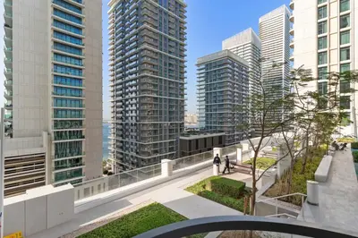 a view of a city with tall buildings at Luxury Stay at Marina Vista, Dubai Harbour in Dubai