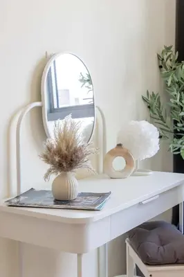 a white console table with a mirror on it at Frank Porter - Harbour Views T1 in Dubai
