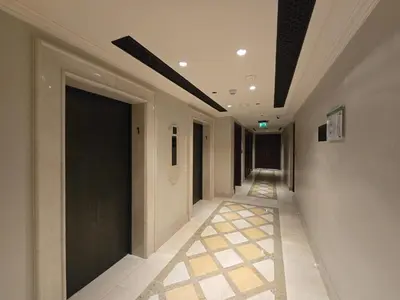 a hallway of a building with a hallwayngth at EasyGo- Spacious, Authentic, City Center in Dubai