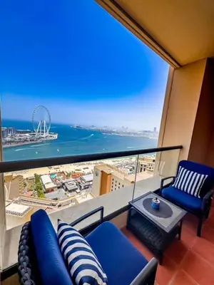 a living room with a view of the ocean at 2Br Panoramic sea view, Ain Dubai, Palm, JBR beach in Dubai