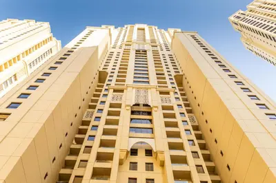 a tall building looking up at the sky at 2Br Panoramic sea view, Ain Dubai, Palm, JBR beach in Dubai