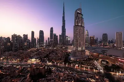 a view of a city with a lot of tall buildings at Lux apartment with full Burj View - 5 min walk to Dubai Mall in Dubai