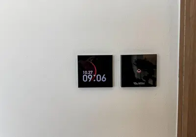 three pictures hanging on a white wall at Brand New Luxurious 1 BR with Garden, Gym, Pool and Open View in Dubai
