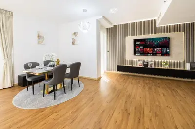 a dining room with a table and chairs at Near Beach Luxurious 2-Bedroom in JBR in Dubai