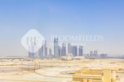 a view of a large city with tall buildings at Bloomfields Cozy 1Br In Binghatti Creek in Dubai