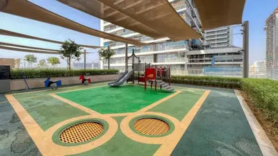 a playground with a slide in a building at TRPS - Beach Isle Tower 1, Dubai Harbour - 1BR Premium Beachfront - Private Beach Access in Dubai