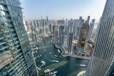 a view of a river in a city with tall buildings at 1BR Jumeirah Living - Marina View - 5 STARS Facilities in Dubai