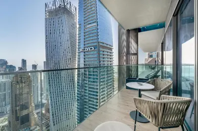 a balcony with a view of a city at 1BR Jumeirah Living - Marina View - 5 STARS Facilities in Dubai