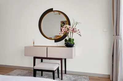 a dressing table with a mirror and a chair at Luxurious, Creek & Marina View in Dubai