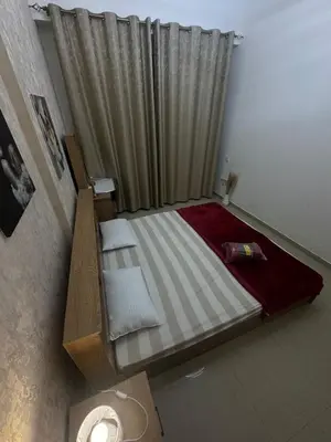 an overhead view of a bed in a room at Dream home in Dubai