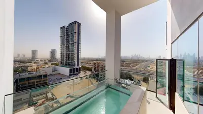 a swimming pool in a building with a view of a city at Binghatti House - Two Bedroom with Private Pool in Dubai