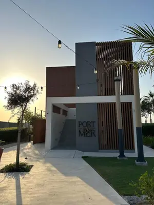 a building with a sign that reads point mixer at La Mer 1BR Ocean View 4 Pax in Dubai