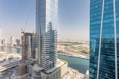 an aerial view of a city with tall buildings at 2BR Near Burj Khalifa & Business Bay Metro Station, Merano Tower, Business Bay in Dubai