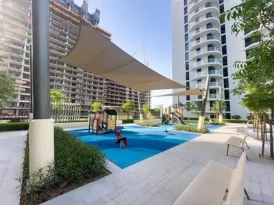a playground with a canopy in a city at ALiving Classy 1BR I Stunning Views I Emaar Palace Beach Residence in Dubai
