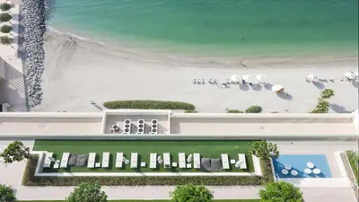 an aerial view of a beach and a building at Luxury 2BR, Panoramic Sea Views and Beach Access in Dubai
