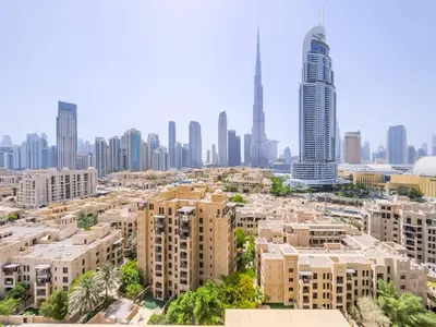 an aerial view of a city with tall buildings at TRPS - Burj Royale, Downtown Dubai - 2BR - Burj Khalifa View - Furnished & Ready in Dubai