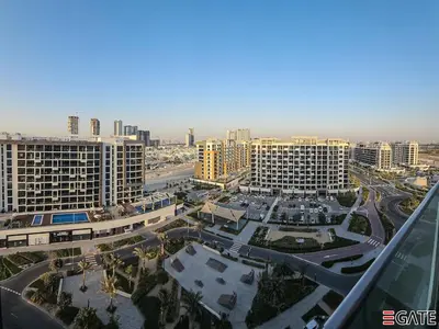 an aerial view of a city with tall buildings at EGATE - Studio - 10th Floor - Balcony with a View - 01-1014 in Dubai