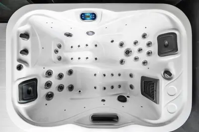 a close up of a white bath tub at Trillionaire Business Bay with Private Jacuzzi in Dubai