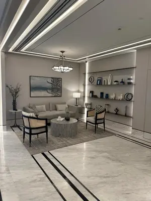 a living room with a couch and a table at Brand new apartment next to Burj Al Arb in Dubai