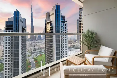 a balcony with a view of a city at LUX The Burj Khalifa Downtown View Studio 2 in Dubai