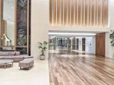 a lobby with a couch and a table at YOUR STAY CORPORATE RESIDENCES DIFC Sky Gardens in Dubai