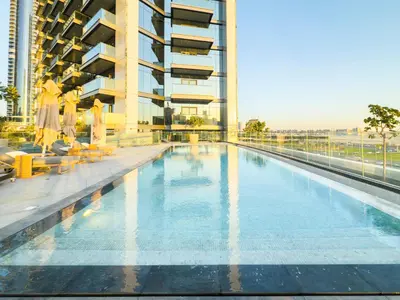 a swimming pool on the roof of a building at Luxurious Apt 2BR Stunning Full Burj Khalifa view in Dubai