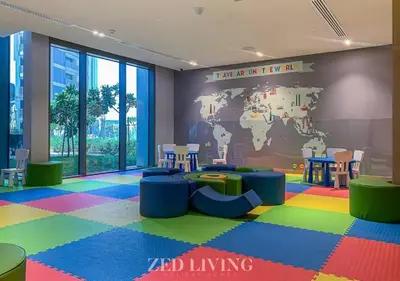 a childrens room with a world map on the wall at Emaar 5242 - Stunning Sea View Stay in Prime Waterfront Location - Zed Living in Dubai