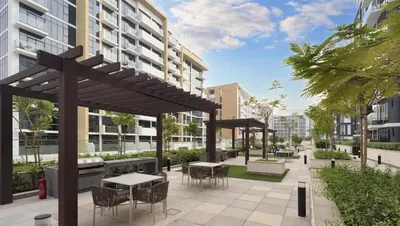 a patio with tables and chairs in a building at New Modern Japanese Style Studio by Downtown in Dubai