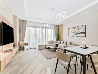 a living room with a couch and a table at Modern Serenity Central Park 2BR Escape-51 in Dubai