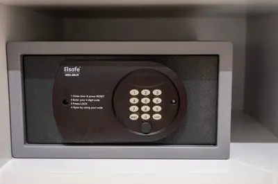 a microwave oven sitting on top of a shelf at Damac Maison - Impression by UDH in Dubai