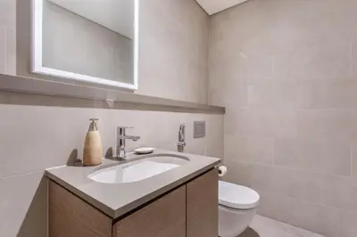 a bathroom with a sink and a toilet at STAY BY LATINEM Luxury 1BR Holiday Home WG2809 Near Burj Khalifa in Dubai