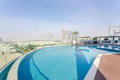 a large swimming pool on top of a building at STAY BY LATINEM Luxury 1BR Holiday Home WG2809 Near Burj Khalifa in Dubai