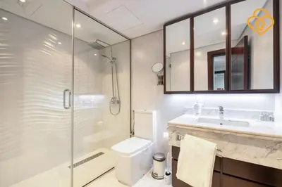 a bathroom with a shower and a toilet and a sink at Keysplease Upgraded 1 BR Apt near Dubai Mall, Burj Views in Dubai