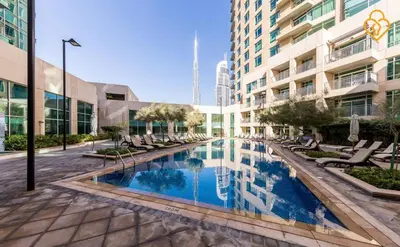 a swimming pool in the middle of a building at Keysplease Upgraded 1 BR Apt near Dubai Mall, Burj Views in Dubai