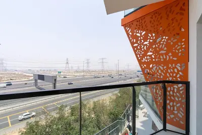 a view of a highway from the balcony of a building at 1 Bedroom in JVC in Dubai