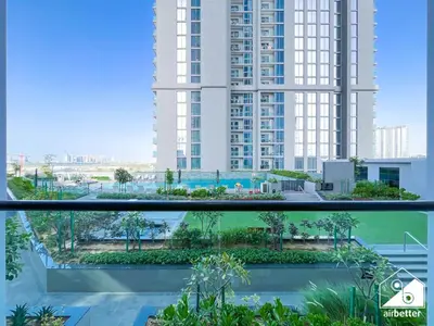 a rendering of the view from the balcony of a building at Modern 2B Apartment with Pool Acess SOBHA CREEK in Dubai