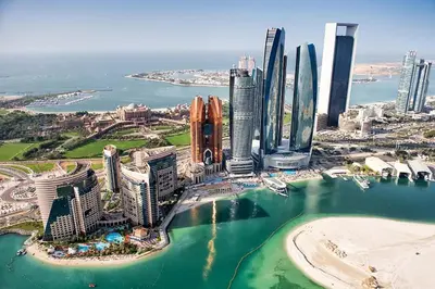 an aerial view of a city with tall buildings at Dubai Marina DElux Studio Apartment sea view in Sabkhah