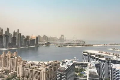 a view of a city with a river and buildings at PVH - Palm Tower - Inviting Studio with Sea View in Dubai