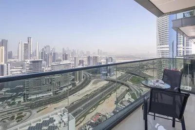 a balcony with a view of a city at Frank Porter - Nobles Tower in Dubai