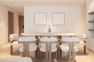 a dining room with a table and chairs at Seraya Residences at Marquise Square Tower in Dubai