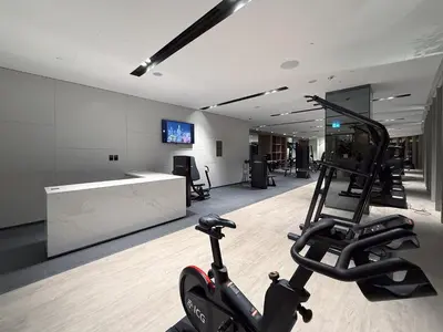 a room with a gym with a treadmill at Full Burj Khalifa and Fountain View from All Rooms in Dubai